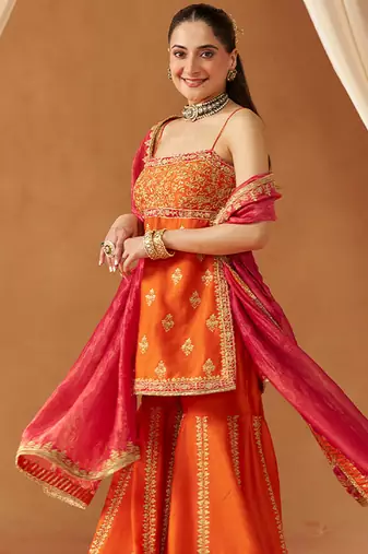Burnt orange kurta with gharara and dupatta
