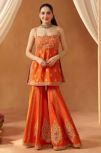 Burnt orange kurta with gharara and dupatta