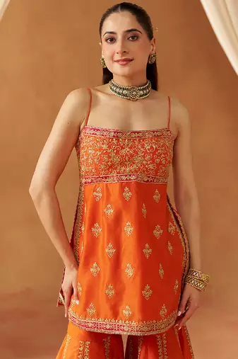 Burnt orange kurta with gharara and dupatta