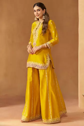 Mustard yellow kurta with sharara and dupatta