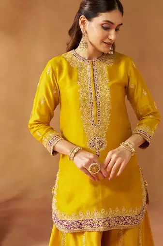 Mustard yellow kurta with sharara and dupatta