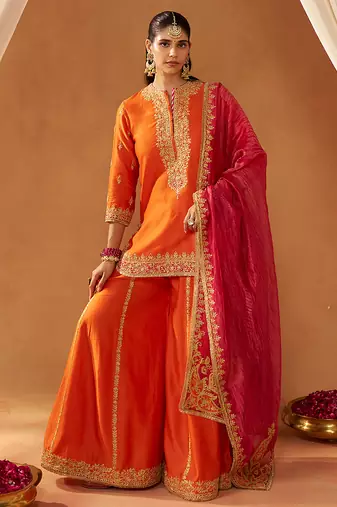 Burnt orange kurta with sharara and dupatta