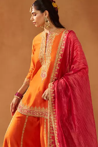 Burnt orange kurta with sharara and dupatta