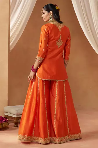 Burnt orange kurta with sharara and dupatta