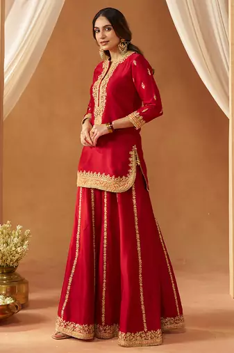 Deep red kurta with sharara and dupatta