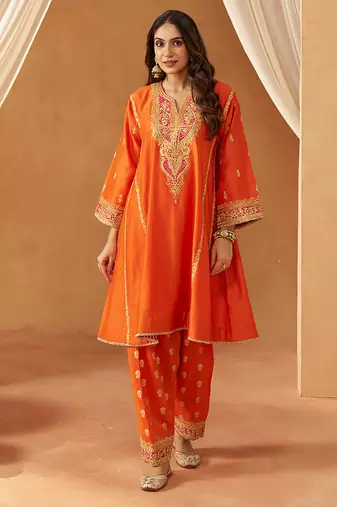 Burnt orange kalidaar chauga with salwar with dupatta