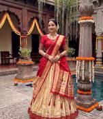 Women's Kanchipuram Silk Zari Woven Lehenga Choli with Paithani Jacquard Dupatta.