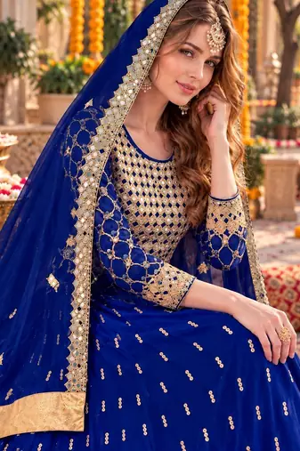Navy silk blend semi stitched anarkali suit with embroidery & stone work