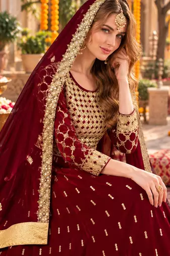 Red silk blend semi stitched anarkali suit with embroidery & stone work