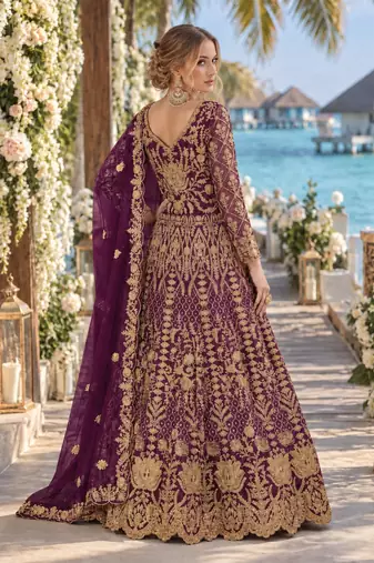 Purple net semi stitched anarkali suit with codding & stone work