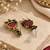 Gold oxidised traditional red green drop earrings
