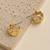 Geometric textured anti tarnish hoop earrings