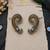 Silver oxidized  pair of peacock ear cuff earrings