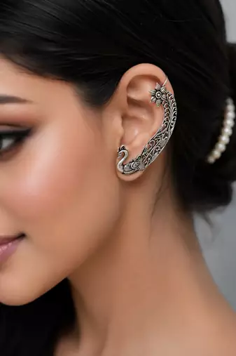 Two tone oxidized pair of peacock ear cuff earrings