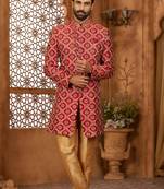 Maroon indo-western sherwani set with full computer embroidery, coloured buttons, and thread, lace, and stone work.