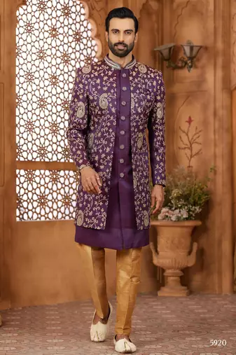Purple indo-western sherwani set with full computer embroidery, coloured buttons, and thread, lace, and stone work.