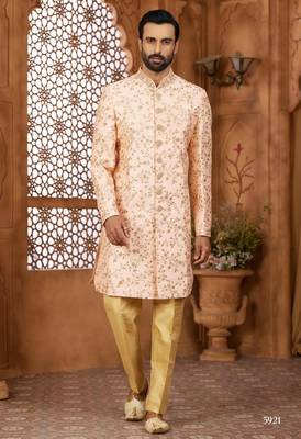 Peach indo-western sherwani set with full computer embroidery, coloured buttons, and thread, lace, and stone work. 1