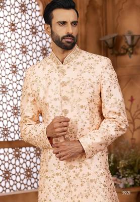 Peach indo-western sherwani set with full computer embroidery, coloured buttons, and thread, lace, and stone work. 2