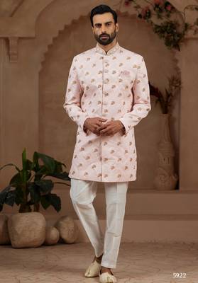 Light pink indo-western sherwani set with full computer embroidery, coloured buttons, and thread, lace, and stone work. 1