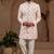 Light pink indo-western sherwani set with full computer embroidery, coloured buttons, and thread, lace, and stone work.