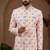 Light pink indo-western sherwani set with full computer embroidery, coloured buttons, and thread, lace, and stone work.
