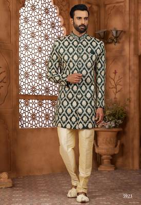 Green indo-western sherwani set with full computer embroidery, coloured buttons, and thread, lace, and stone work. 1