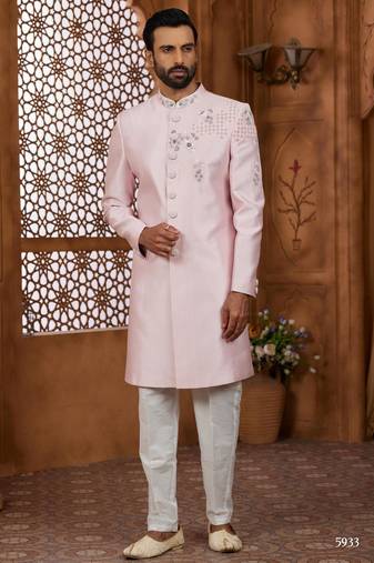 Peach classic indo-western sherwani set with handwork on the neck & buttons,resham thread, stone & beads work.