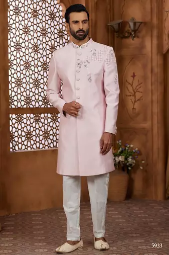 Peach classic indo-western sherwani set with handwork on the neck & buttons,resham thread, stone & beads work.
