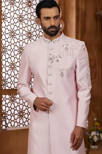 Peach classic indo-western sherwani set with handwork on the neck & buttons,resham thread, stone & beads work.
