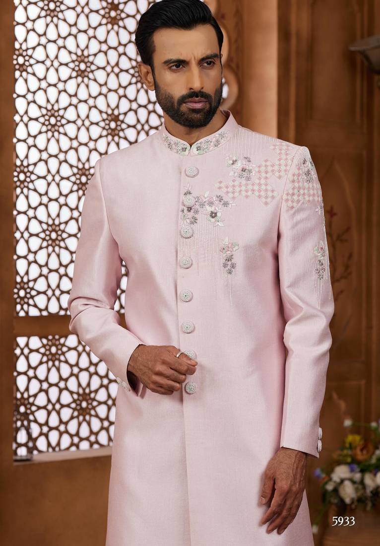 Peach classic indo-western sherwani set with handwork on the neck & buttons,resham thread, stone & beads work.