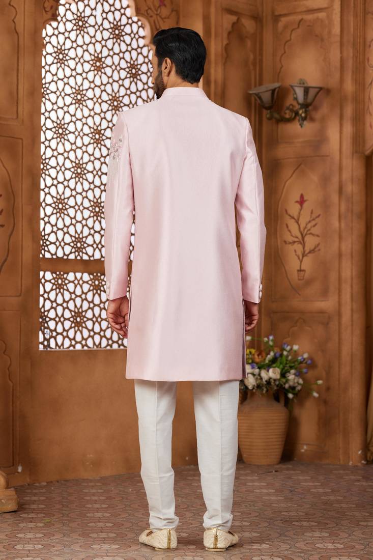 Peach classic indo-western sherwani set with handwork on the neck & buttons,resham thread, stone & beads work.