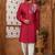 Red indo-western sherwani set with full computer embroidery, coloured buttons, and thread, lace, and stone work.
