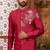 Red indo-western sherwani set with full computer embroidery, coloured buttons, and thread, lace, and stone work.