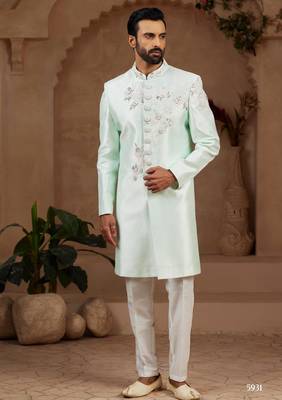 Mint green classic indo-western sherwani set with handwork on neck & buttons,resham thread, stone & beads work. 1