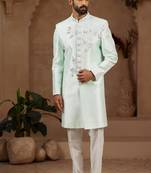 Mint green classic indo-western sherwani set with handwork on neck & buttons,resham thread, stone & beads work.