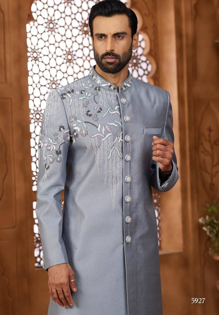 Grey classic indo-western sherwani set with handwork on the neck & buttons, featuring resham thread, stone & beads work.