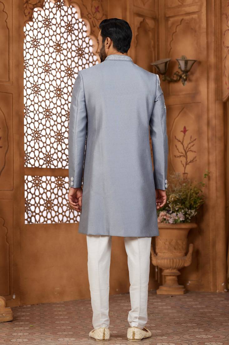 Grey classic indo-western sherwani set with handwork on the neck & buttons, featuring resham thread, stone & beads work.