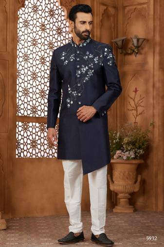 Blue classic indo-western sherwani set with handwork on the neck & buttons, featuring resham thread, stone & beads work.
