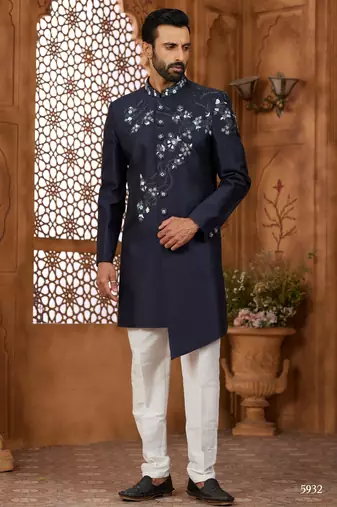 Blue classic indo-western sherwani set with handwork on the neck & buttons, featuring resham thread, stone & beads work.