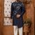 Blue classic indo-western sherwani set with handwork on the neck & buttons, featuring resham thread, stone & beads work.