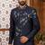 Blue classic indo-western sherwani set with handwork on the neck & buttons, featuring resham thread, stone & beads work.