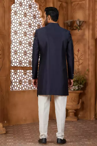 Blue classic indo-western sherwani set with handwork on the neck & buttons, featuring resham thread, stone & beads work.