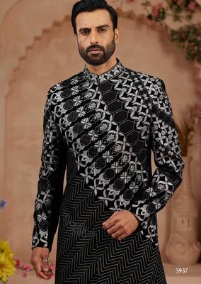 Black classic velvet indo-western sherwani set with full computer embroidery, thread and star work, and fancy buttons. 2