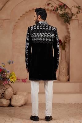 Black classic velvet indo-western sherwani set with full computer embroidery, thread and star work, and fancy buttons. 3