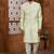 Pista green classic indo-western sherwani set with handwork on neck & buttons,resham thread, stone & beads work.