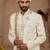 Cream heavy sherwani three-piece set with full hand embroidery, stone work, and resham thread detailing.