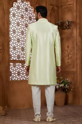 Pista green classic indo-western sherwani set with handwork on neck & buttons,resham thread, stone & beads work.
