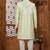 Pista green classic indo-western sherwani set with handwork on neck & buttons,resham thread, stone & beads work.