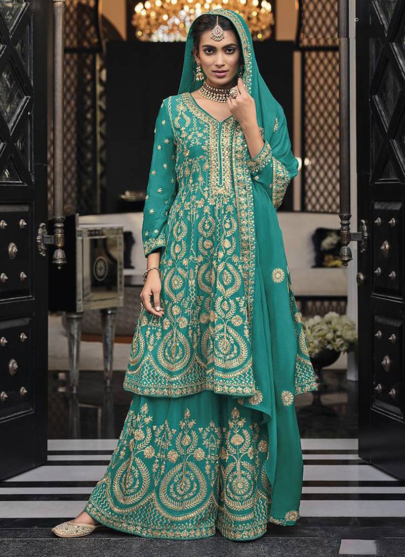 Faux georgette embroidered palazzo kameez in turquoise