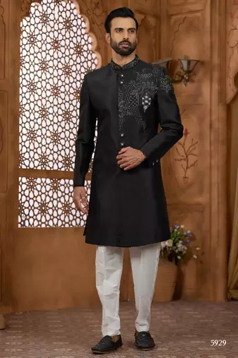 Black classic indo-western sherwani set with handwork on neck & buttons,resham thread, stone & beads work.